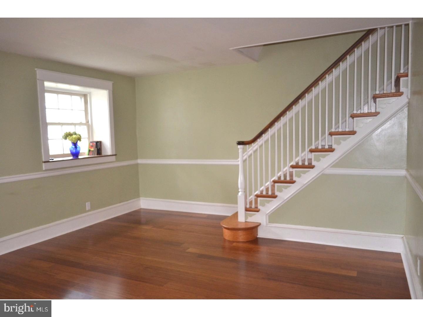129 Walsh Road Lansdowne, PA 19050 - Photo 5 of 25 a view of entryway and hall with wooden floor
