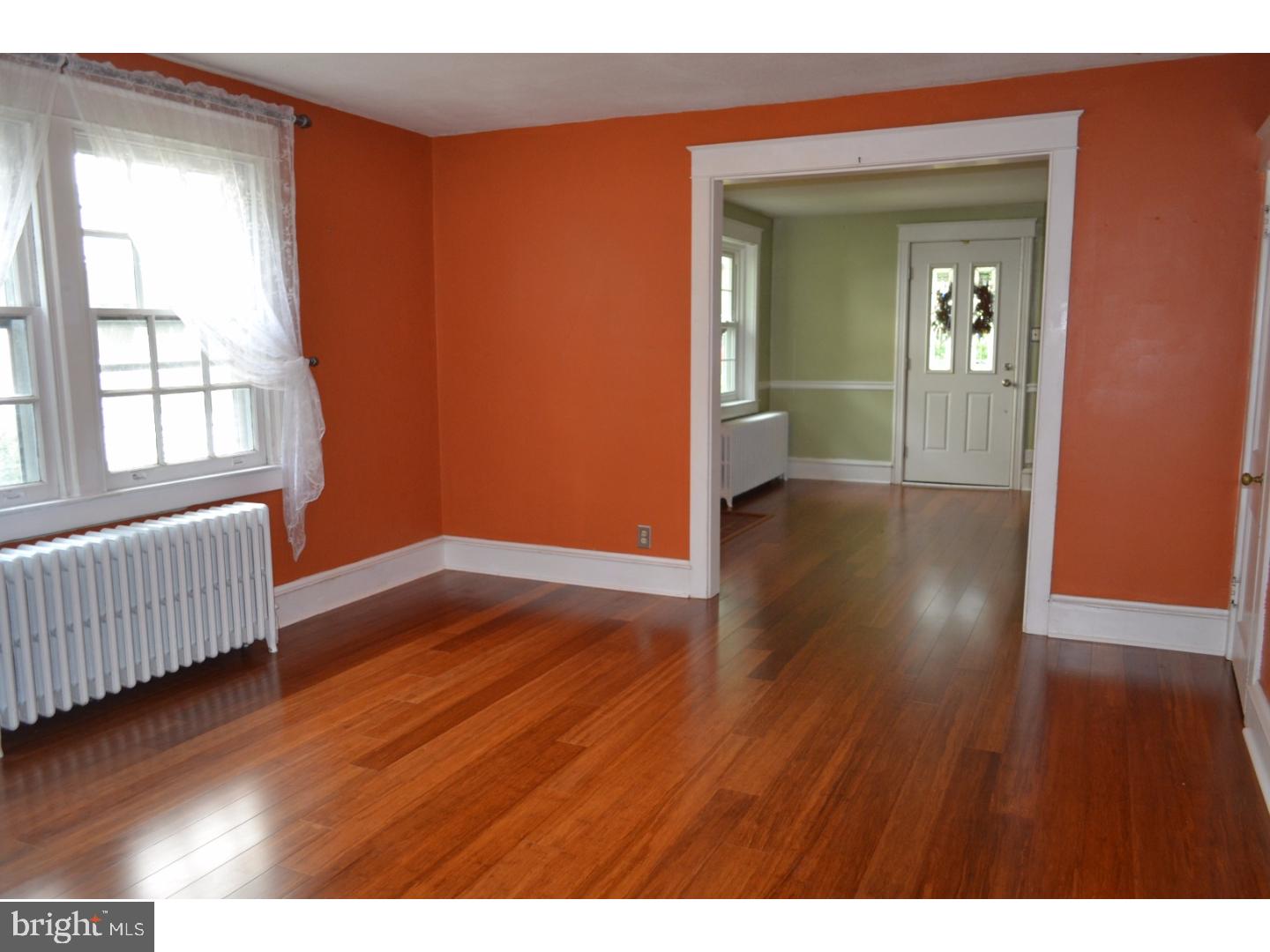 129 Walsh Road Lansdowne, PA 19050 - Photo 7 of 25 a view of livingroom with hardwood floor and hallway