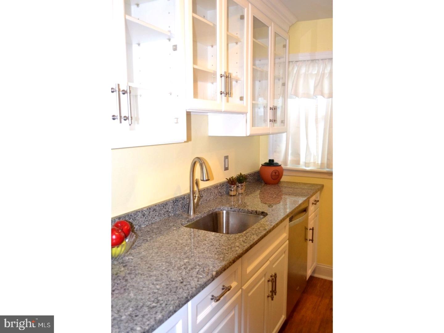 129 Walsh Road Lansdowne, PA 19050 - Photo 10 of 25 a kitchen with sink and cabinets