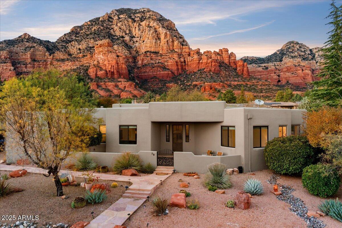 50 Ranch Road Sedona, AZ 86336 - Photo 1 of 51 a view of a house with a yard