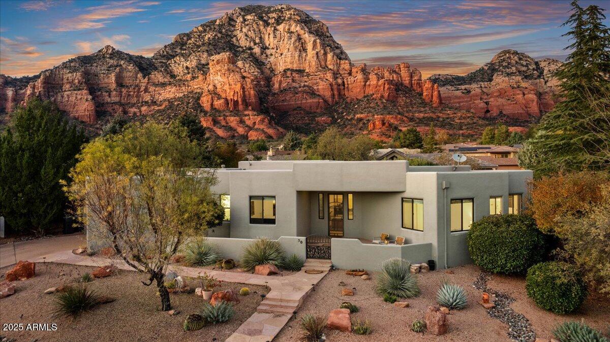 50 Ranch Road Sedona, AZ 86336 - Photo 11 of 51 a view of a house with a yard and sitting area
