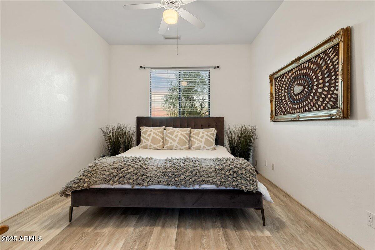 50 Ranch Road Sedona, AZ 86336 - Photo 20 of 51 a bedroom with a bed and a window