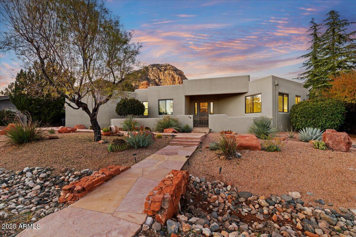 50 Ranch Road Sedona, AZ 86336 - Photo 2 of 51 a view of a house with a patio