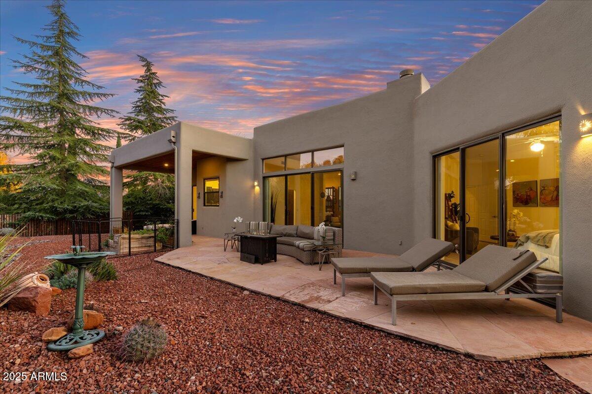 50 Ranch Road Sedona, AZ 86336 - Photo 24 of 51 a view of a house with backyard porch and furniture