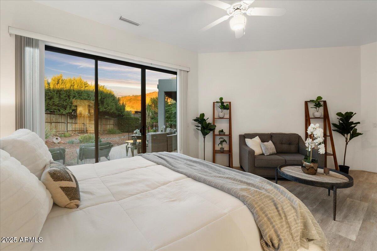 50 Ranch Road Sedona, AZ 86336 - Photo 30 of 51 a bedroom with a bed and a large window