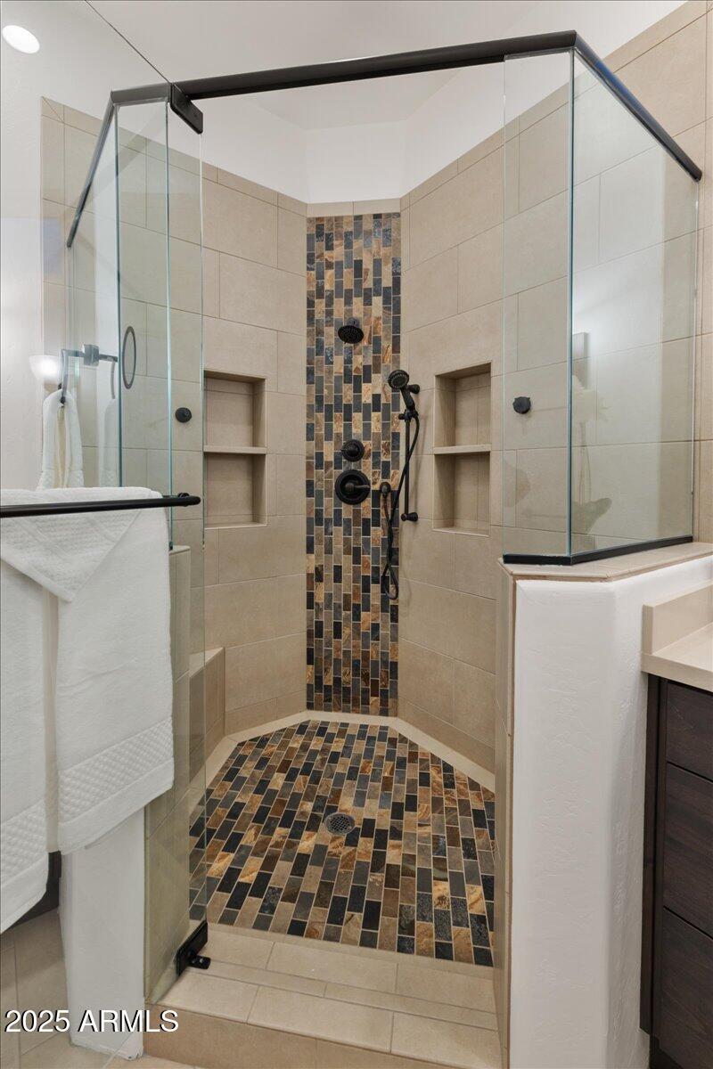 50 Ranch Road Sedona, AZ 86336 - Photo 32 of 51 a bathroom with a sink and a mirror