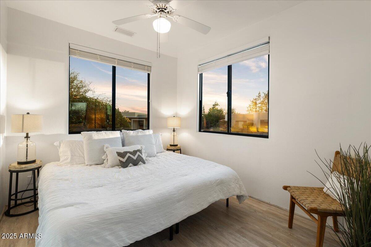 50 Ranch Road Sedona, AZ 86336 - Photo 38 of 51 a bedroom with a large bed and a window