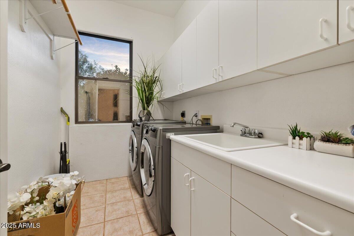 50 Ranch Road Sedona, AZ 86336 - Photo 50 of 51 a utility room with a sink a washer and dryer