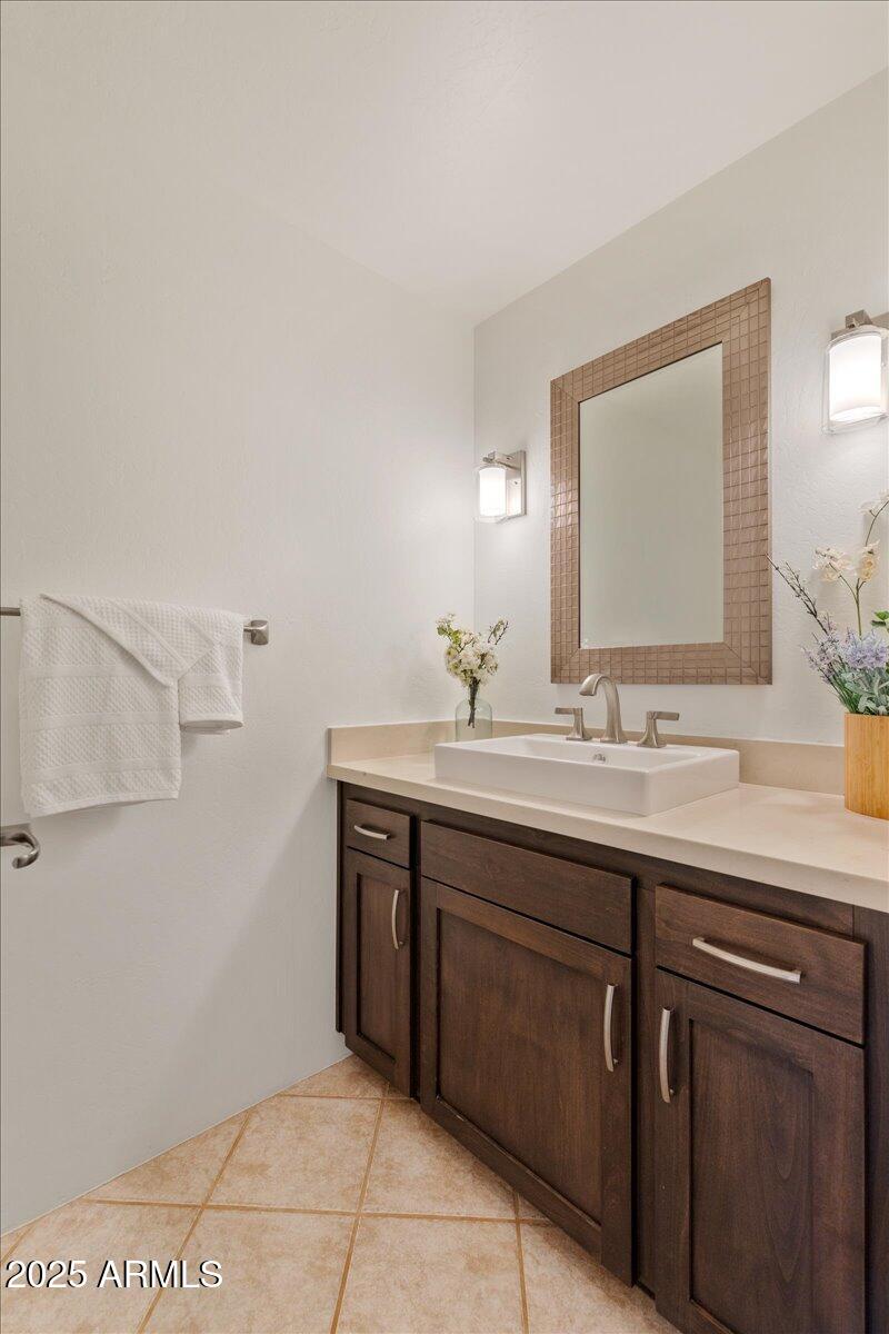50 Ranch Road Sedona, AZ 86336 - Photo 51 of 51 a bathroom with a sink and a mirror