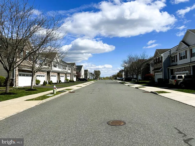 a view of a street with houses