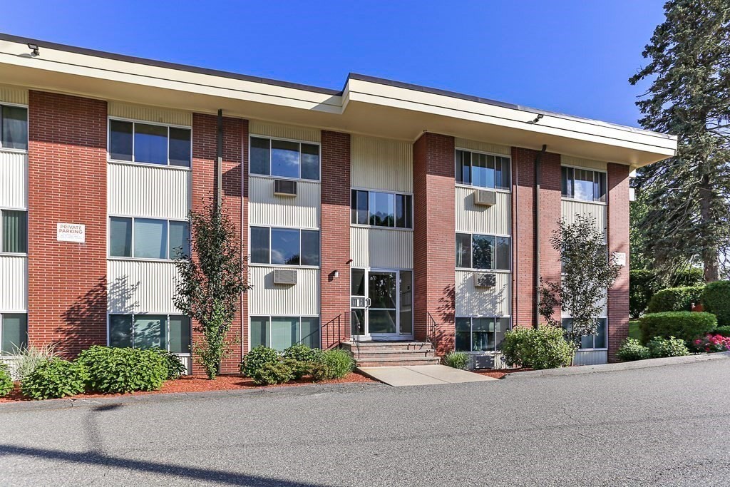74 Beach Street, Unit 12 Woburn, MA 01801 - Photo 1 of 14 front view of a house