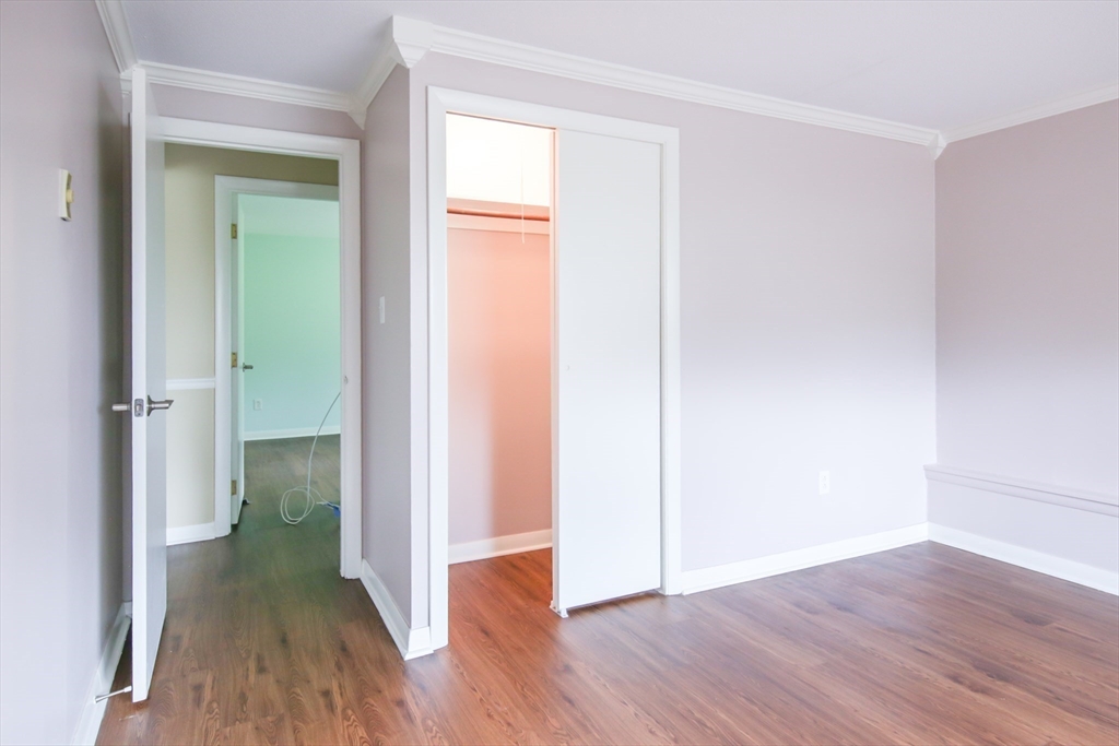 74 Beach Street, Unit 12 Woburn, MA 01801 - Photo 9 of 14 a view of a small space with wooden floor