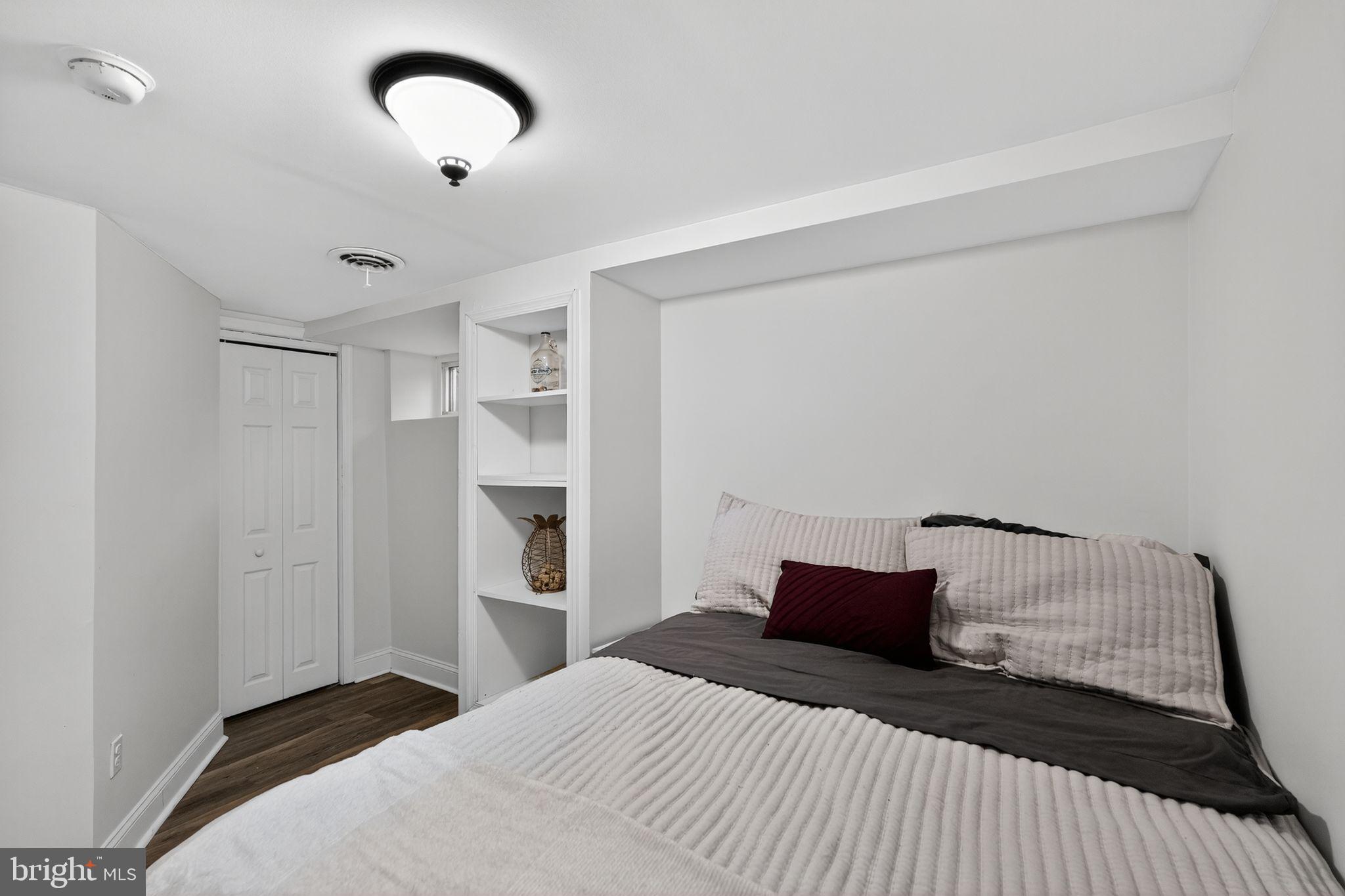 289 Cheswold Road Drexel Hill, PA 19026 - Photo 18 of 29 a bedroom with a bed and closet