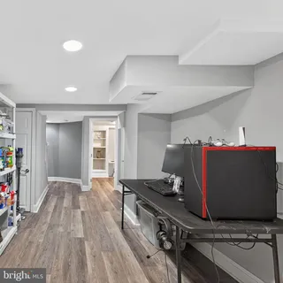 a room with furniture and gym equipment