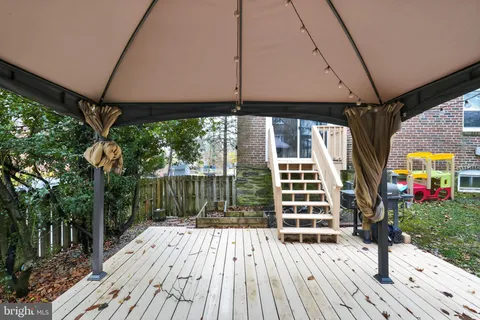 a view of swimming pool with a patio