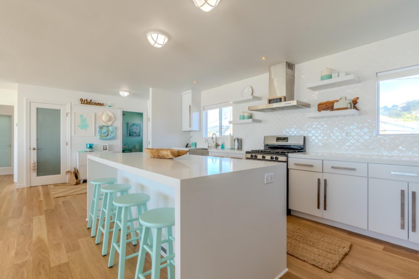 236 Shoreview Avenue Pacifica, CA 94044 - Photo 14 of 61 a kitchen with stainless steel appliances granite countertop a sink and cabinets