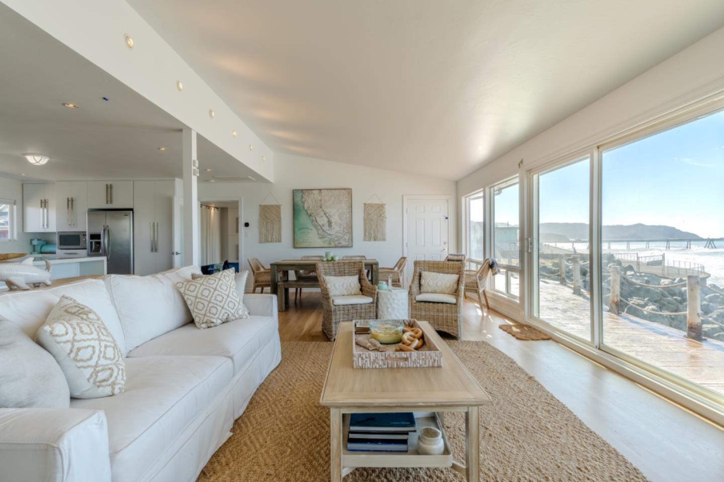 236 Shoreview Avenue Pacifica, CA 94044 - Photo 22 of 61 a living room with furniture and a large window