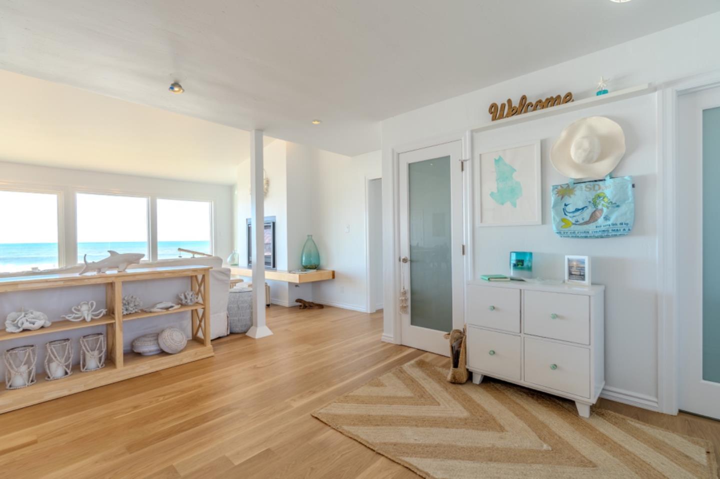 236 Shoreview Avenue Pacifica, CA 94044 - Photo 30 of 61 a spacious bathroom with a double vanity sink a two mirror a bathtub and next to a window