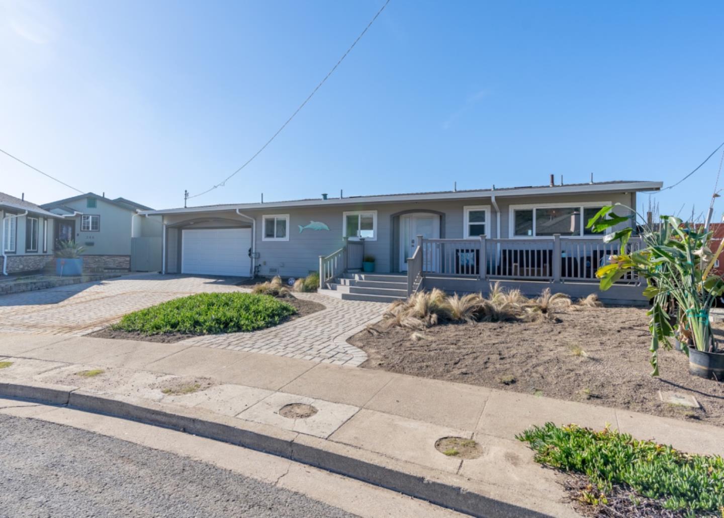 236 Shoreview Avenue Pacifica, CA 94044 - Photo 3 of 61 a front view of a house with garden and plants