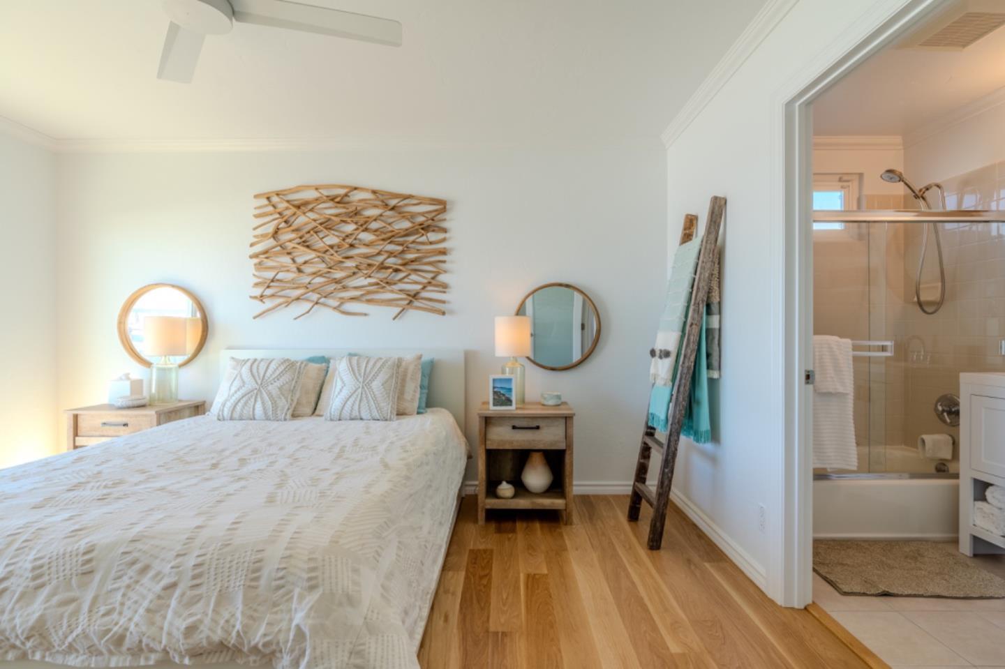 236 Shoreview Avenue Pacifica, CA 94044 - Photo 36 of 61 a bed room with a bed mirror and a table