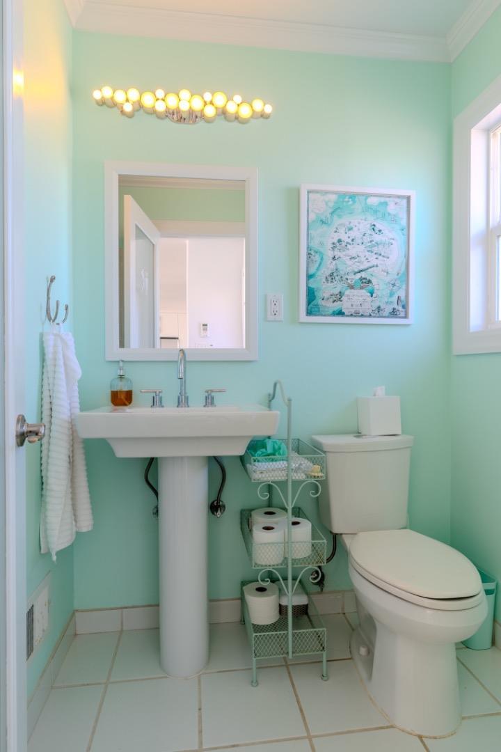 236 Shoreview Avenue Pacifica, CA 94044 - Photo 41 of 61 a bathroom with a sink mirror and toilet