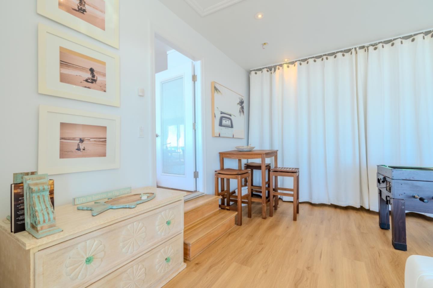 236 Shoreview Avenue Pacifica, CA 94044 - Photo 52 of 61 a view of a workspace with furniture and wooden floor