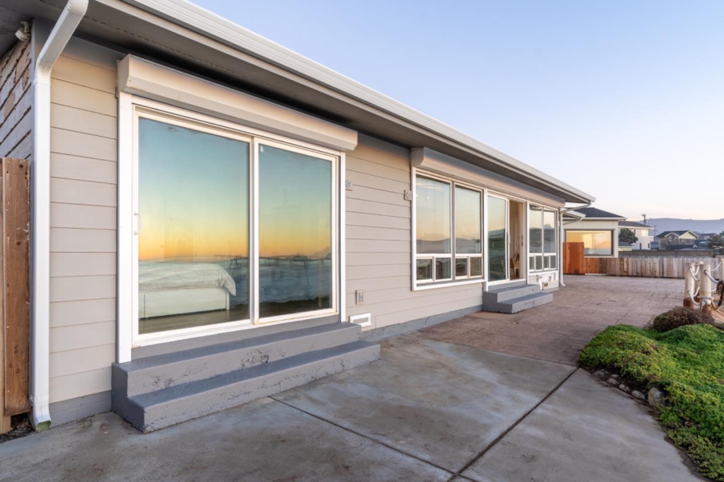236 Shoreview Avenue Pacifica, CA 94044 - Photo 56 of 61 a view of backyard with large window and flower plants