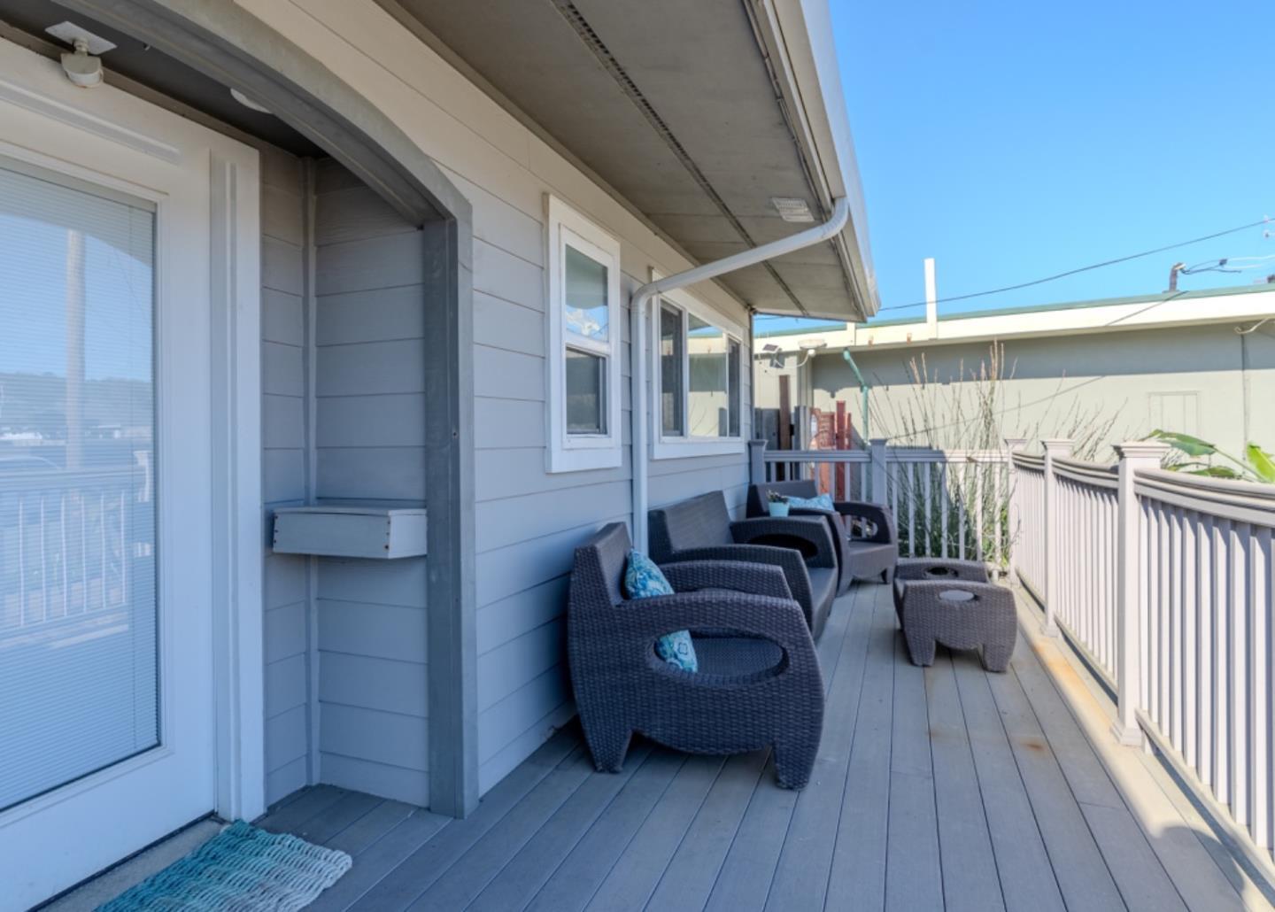 236 Shoreview Avenue Pacifica, CA 94044 - Photo 7 of 61 a view of a deck with wooden floor and seating space