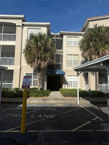 a front view of a house with street