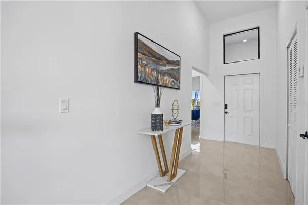 a view of a hallway with workspace