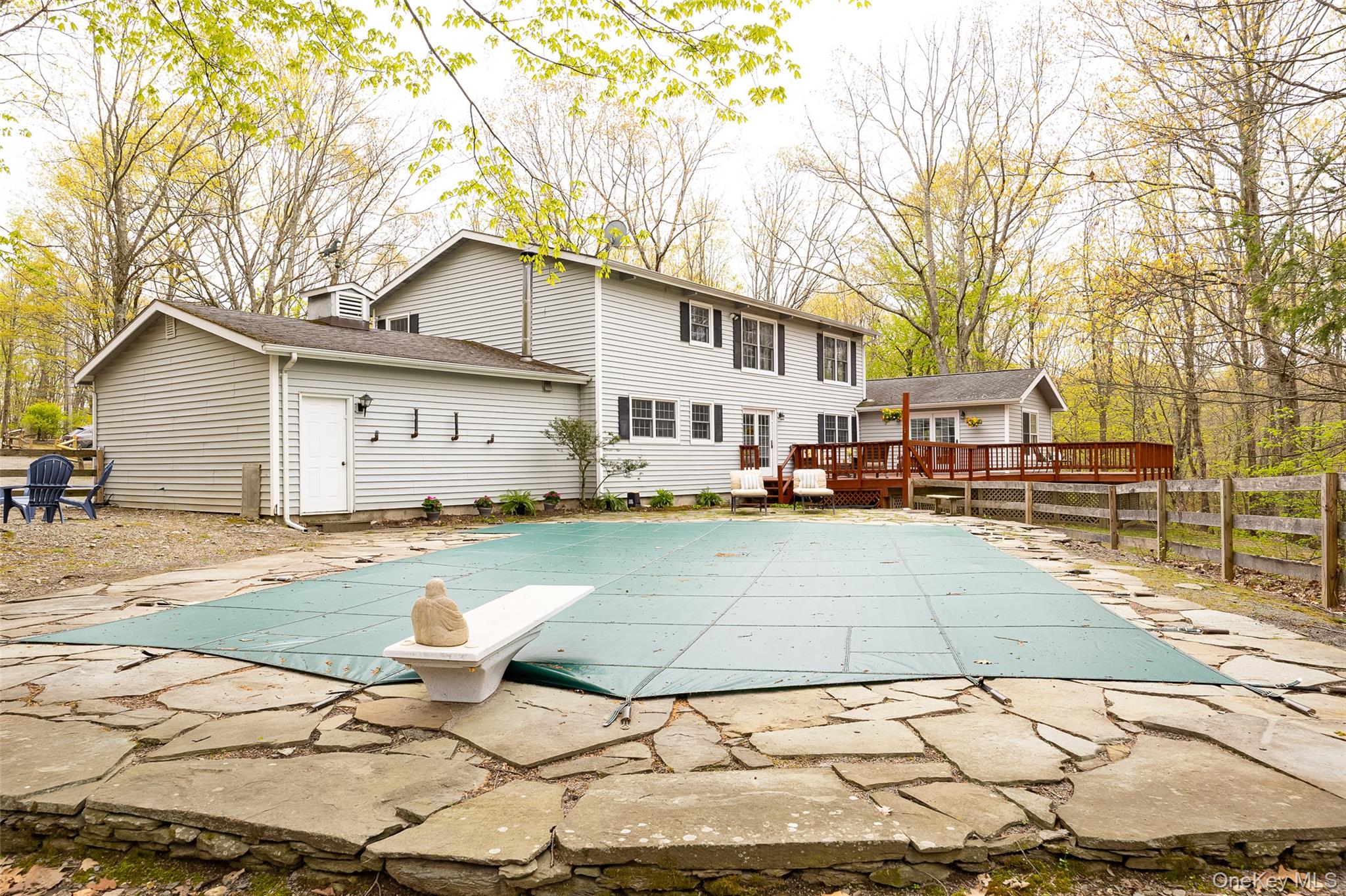 33 Willow Brook Ridge Clinton Corners, NY 12514 - Photo 11 of 50 a view of a white house with a yard