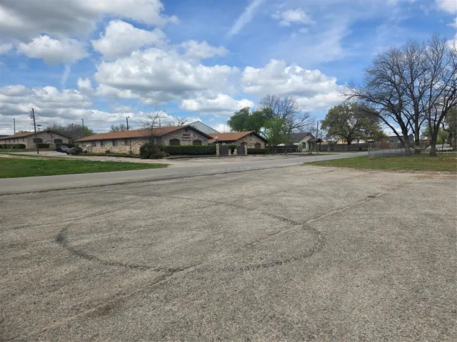 a view of yard with swimming pool