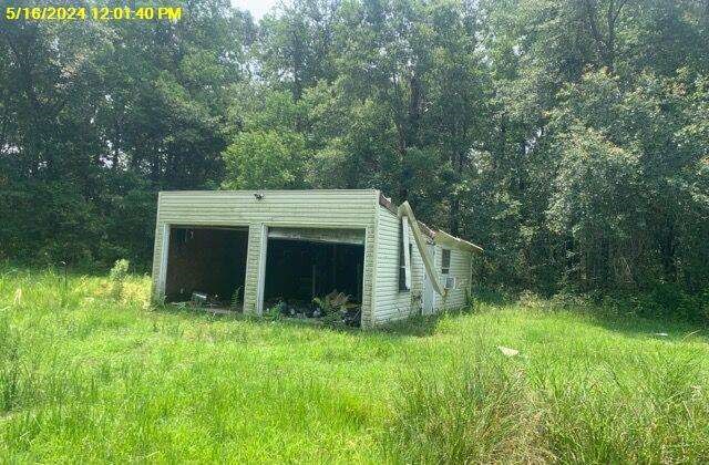 8105 Kestrel E Road Orange, TX 77632 - Photo 5 of 5 a view of backyard with green space