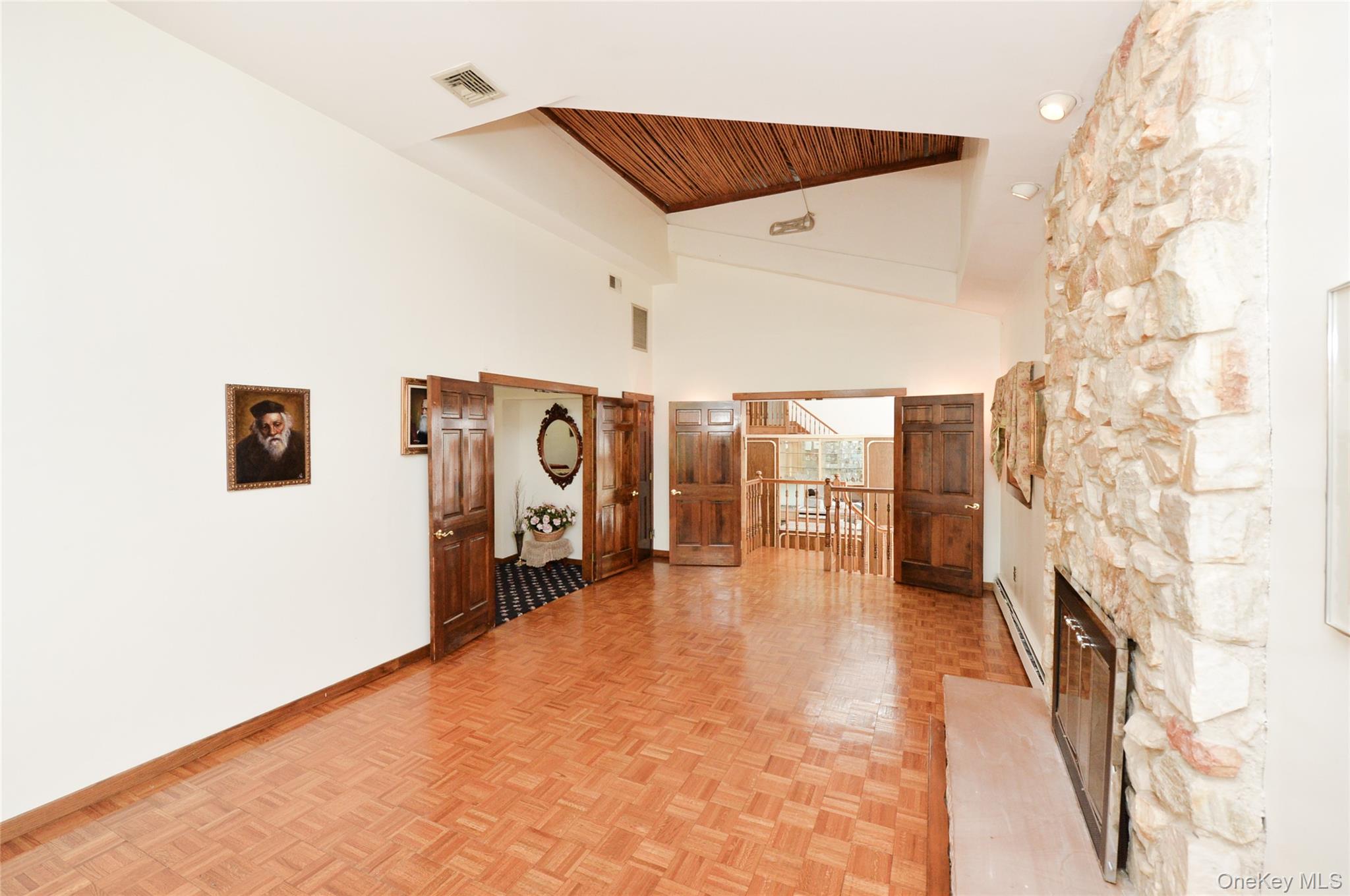 24 Highview Road Monsey, NY 10952 - Photo 9 of 44 a view of a livingroom with furniture and a hallway