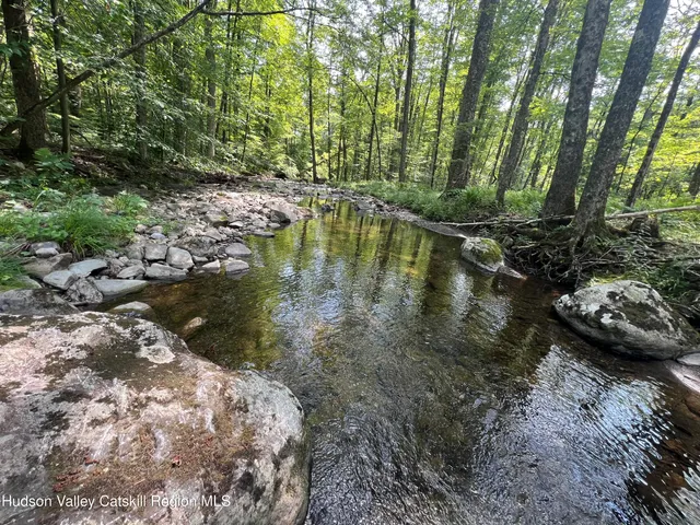 a picture of a room with a bench