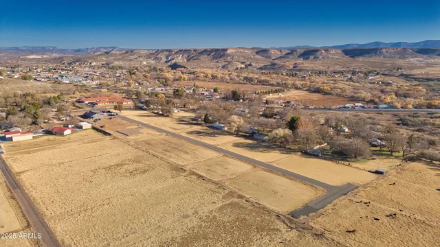 a view of an ocean and a mountain