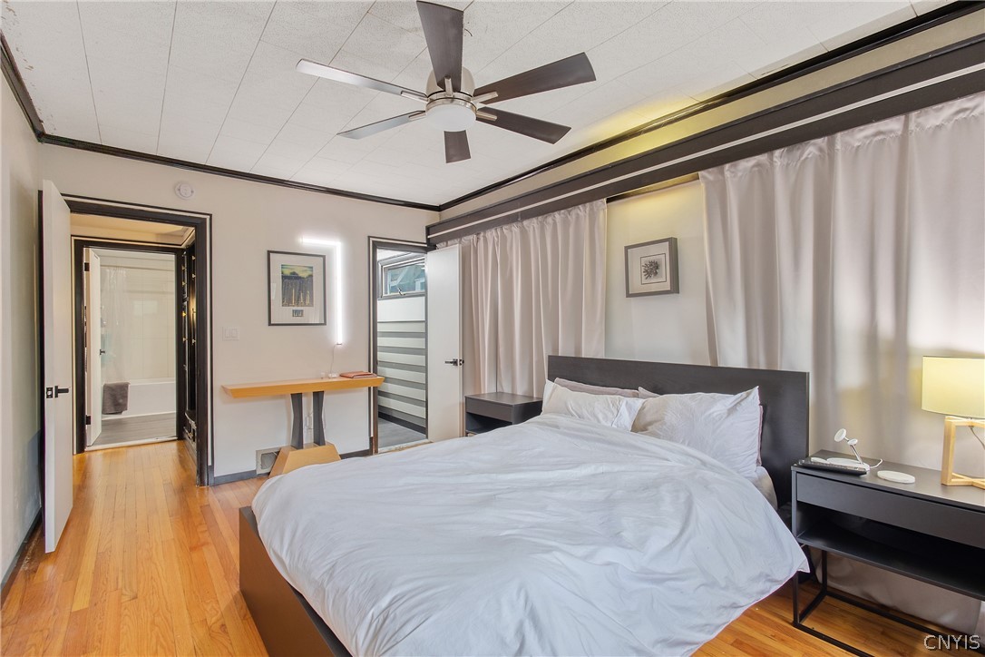 112 Winthrop Road Syracuse, NY 13206 - Photo 6 of 42 Restful Main-Level Bedroom Suite with Gleaming Har