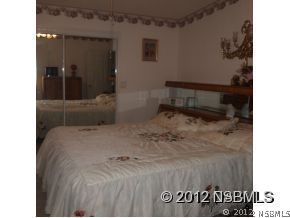 746 Navigators Way Edgewater, FL 32141 - Photo 14 of 14 a view of a bedroom
