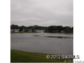 746 Navigators Way Edgewater, FL 32141 - Photo 5 of 14 a view of lake