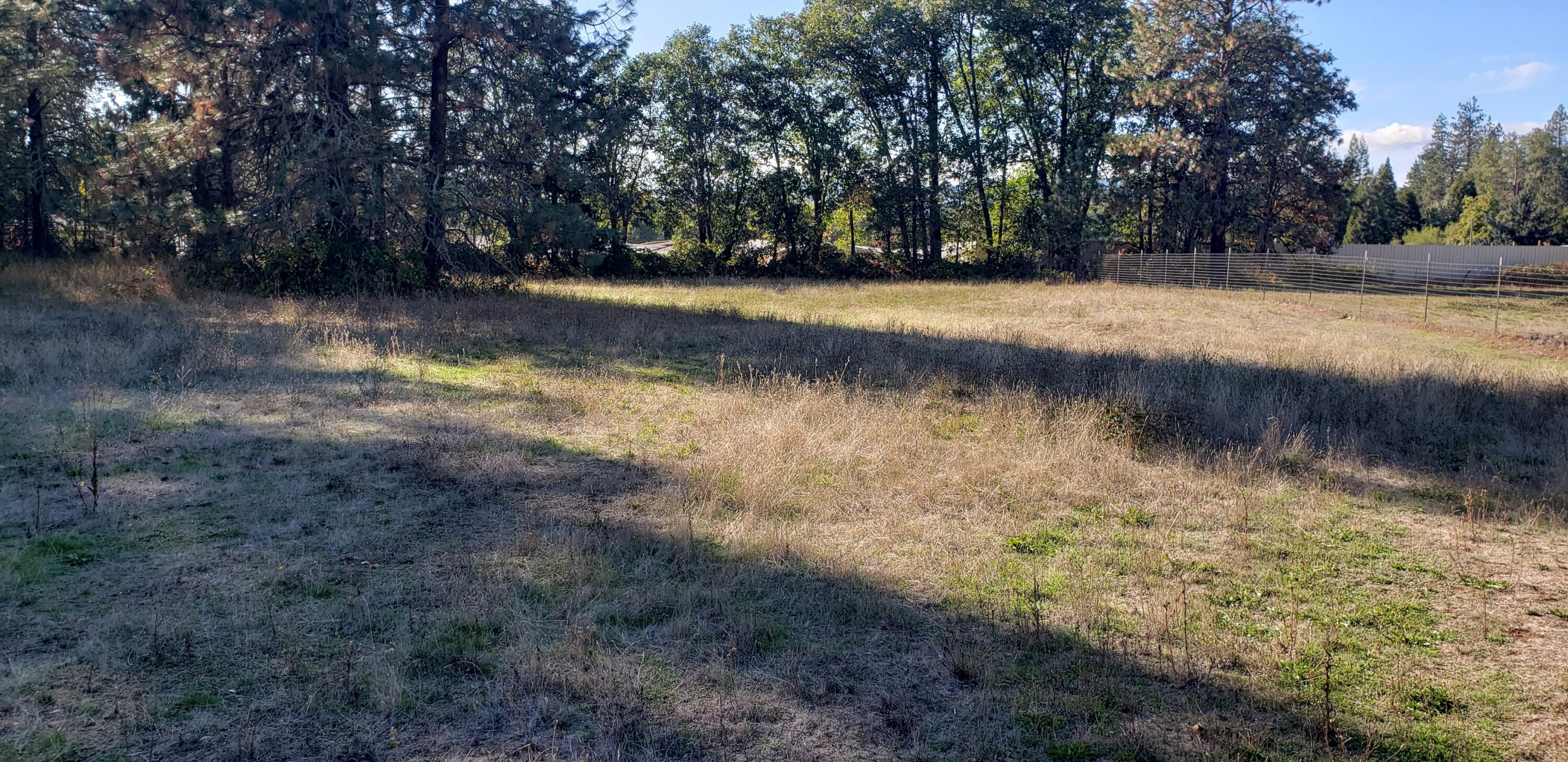 5565 Holland Loop Road Cave Junction, OR 97523 - Photo 11 of 19 Just one of several fenced pastures areas.