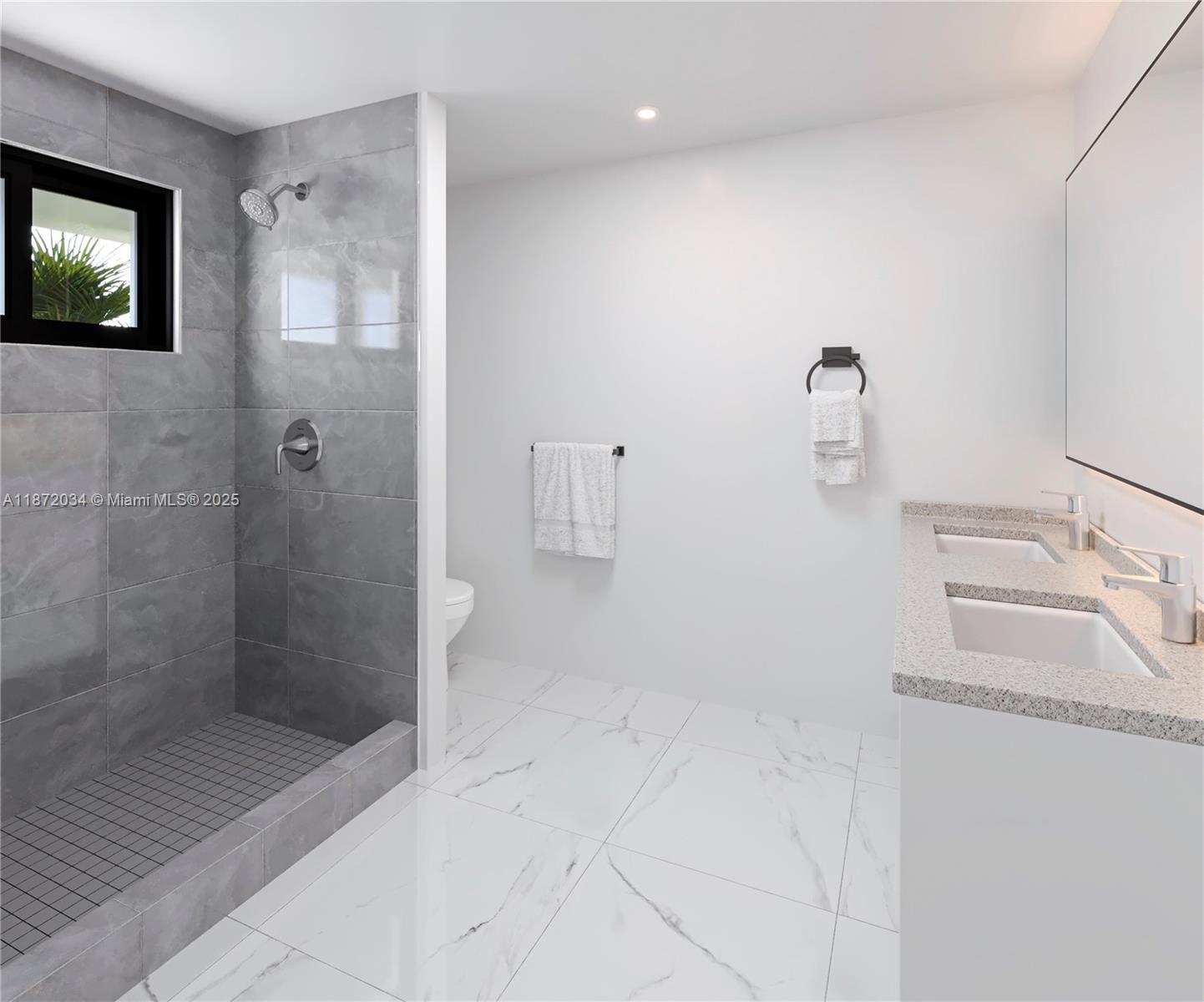 731 Southwest 12th Avenue Homestead, FL 33030 - Photo 6 of 7 a bathroom with a sink a toilet and shower