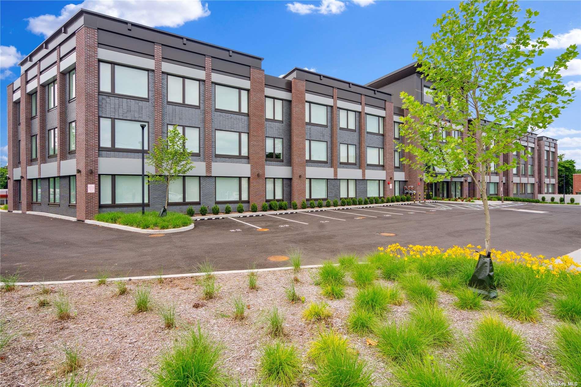 218 Middle Neck Road, Unit 110 Great Neck, NY 11021 - Photo 4 of 19 a view of a building with a street