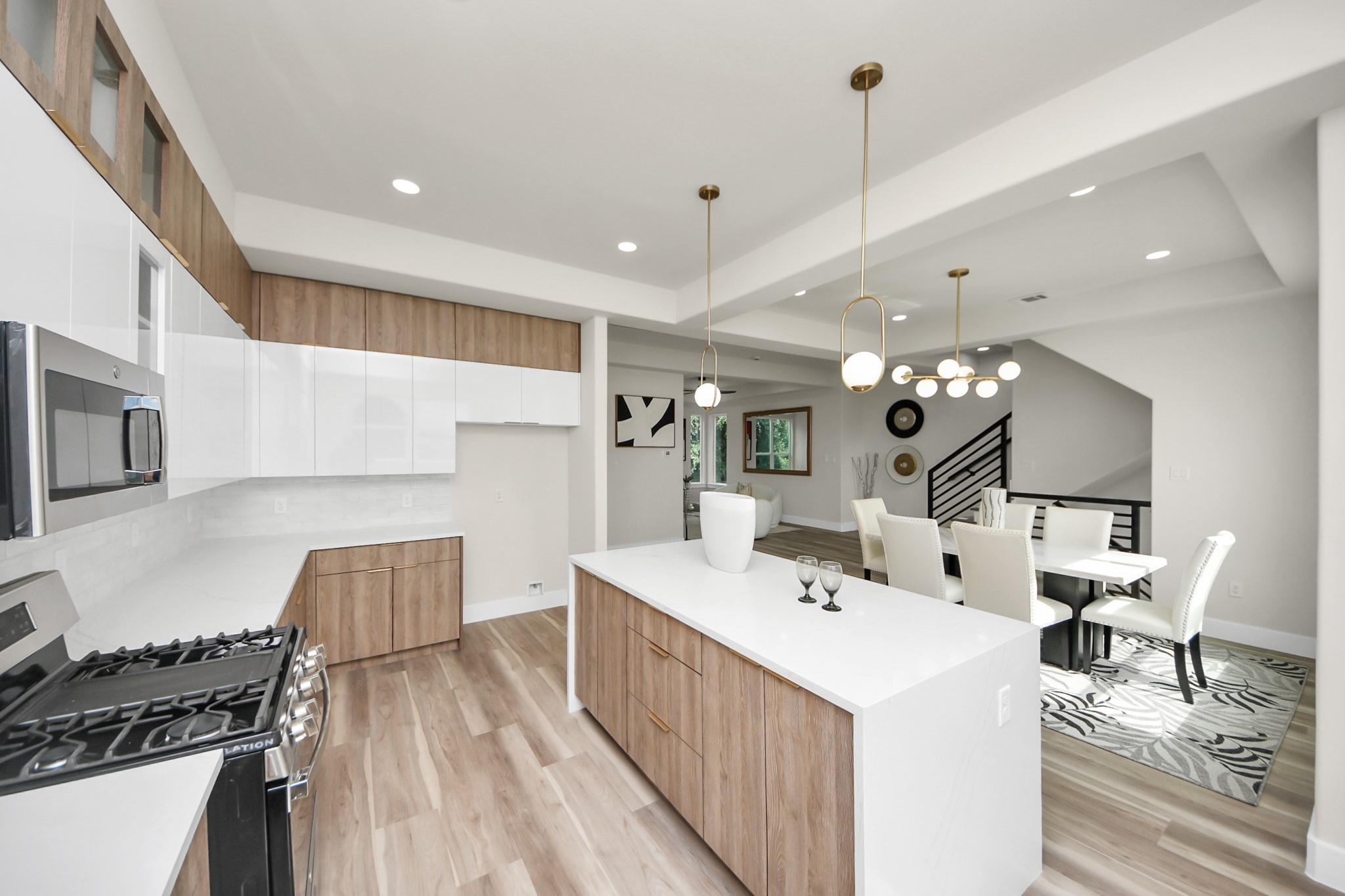 2014 Blodgett Street Houston, TX 77004 - Photo 16 of 49 a kitchen with a sink stove and cabinets