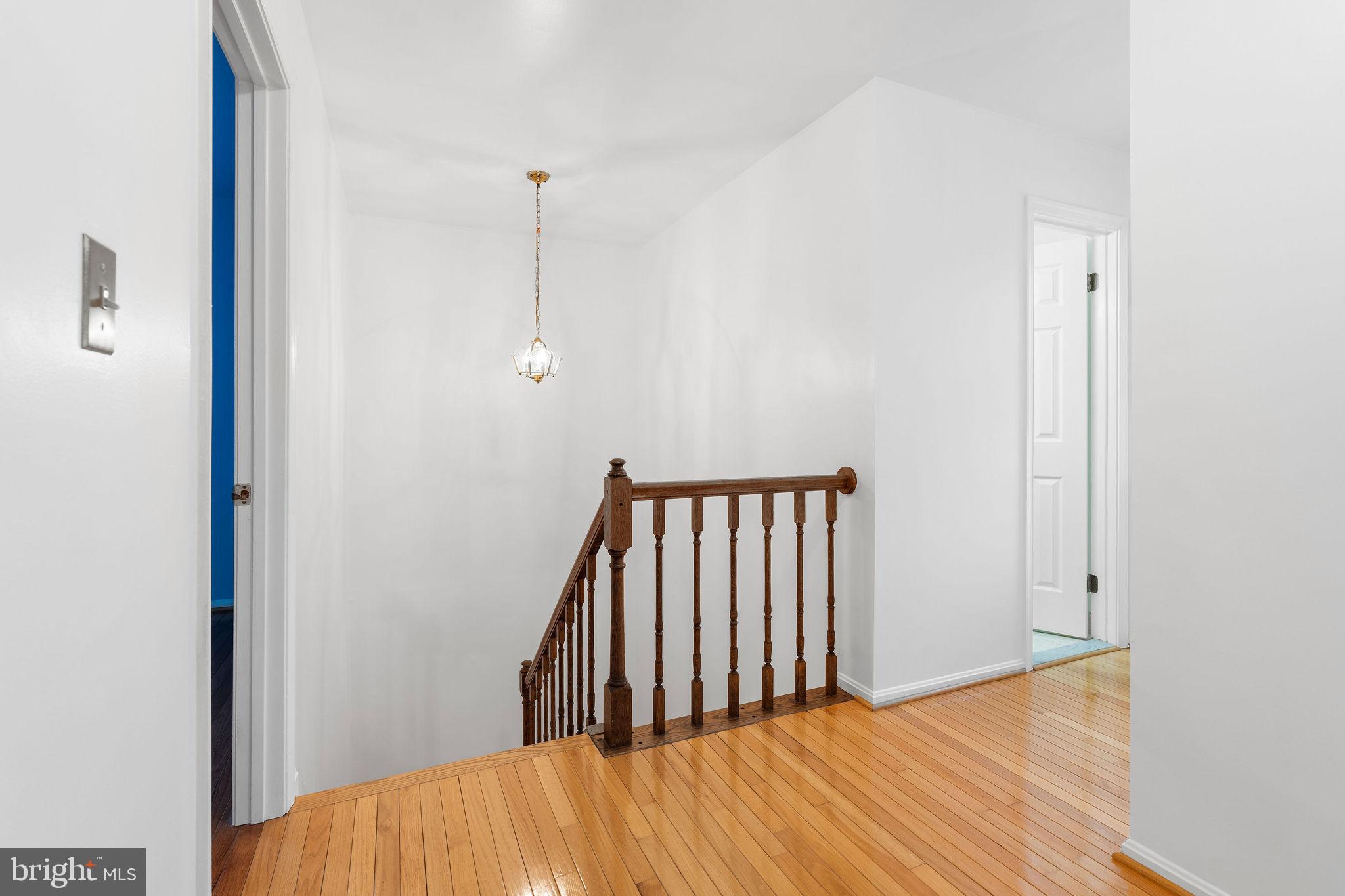 9301 Bellbeck Road Baltimore, MD 21234 - Photo 14 of 35 a view of a room with wooden floor