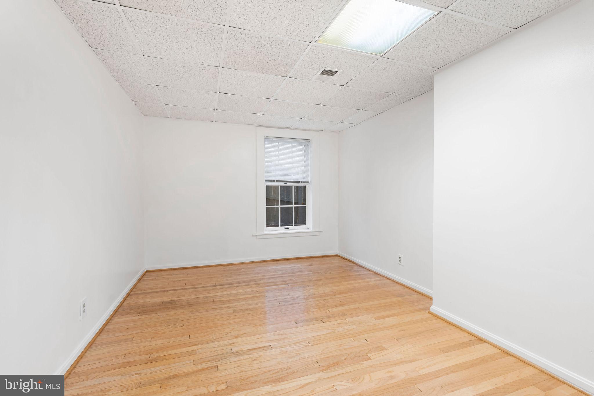 9301 Bellbeck Road Baltimore, MD 21234 - Photo 26 of 35 a view of empty room with wooden floor