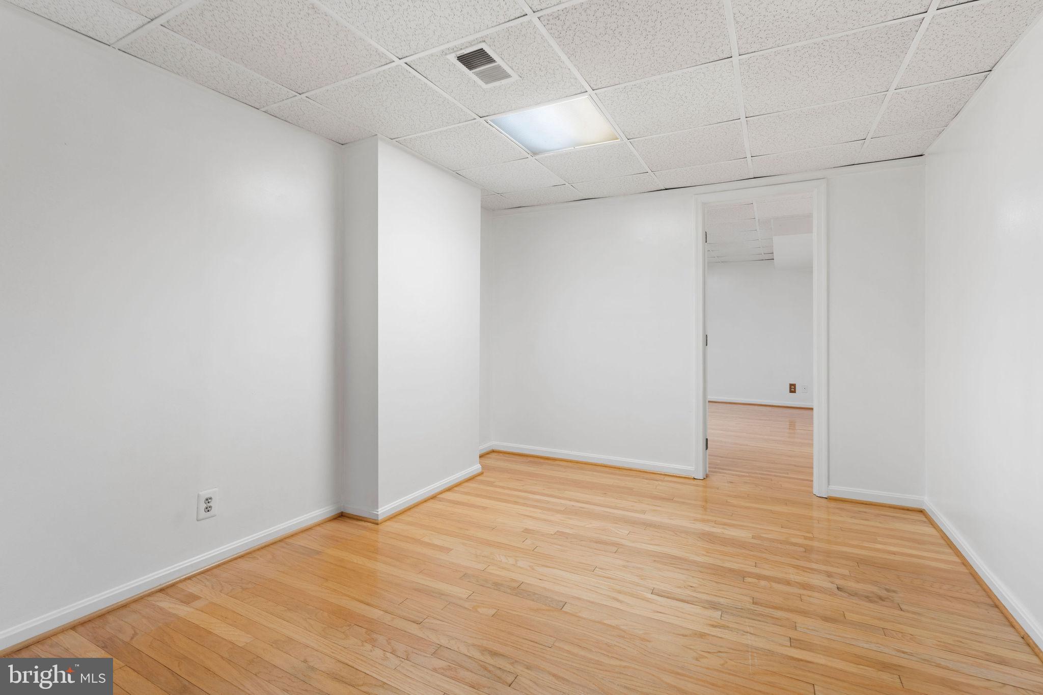 9301 Bellbeck Road Baltimore, MD 21234 - Photo 27 of 35 a view of empty room with wooden floor