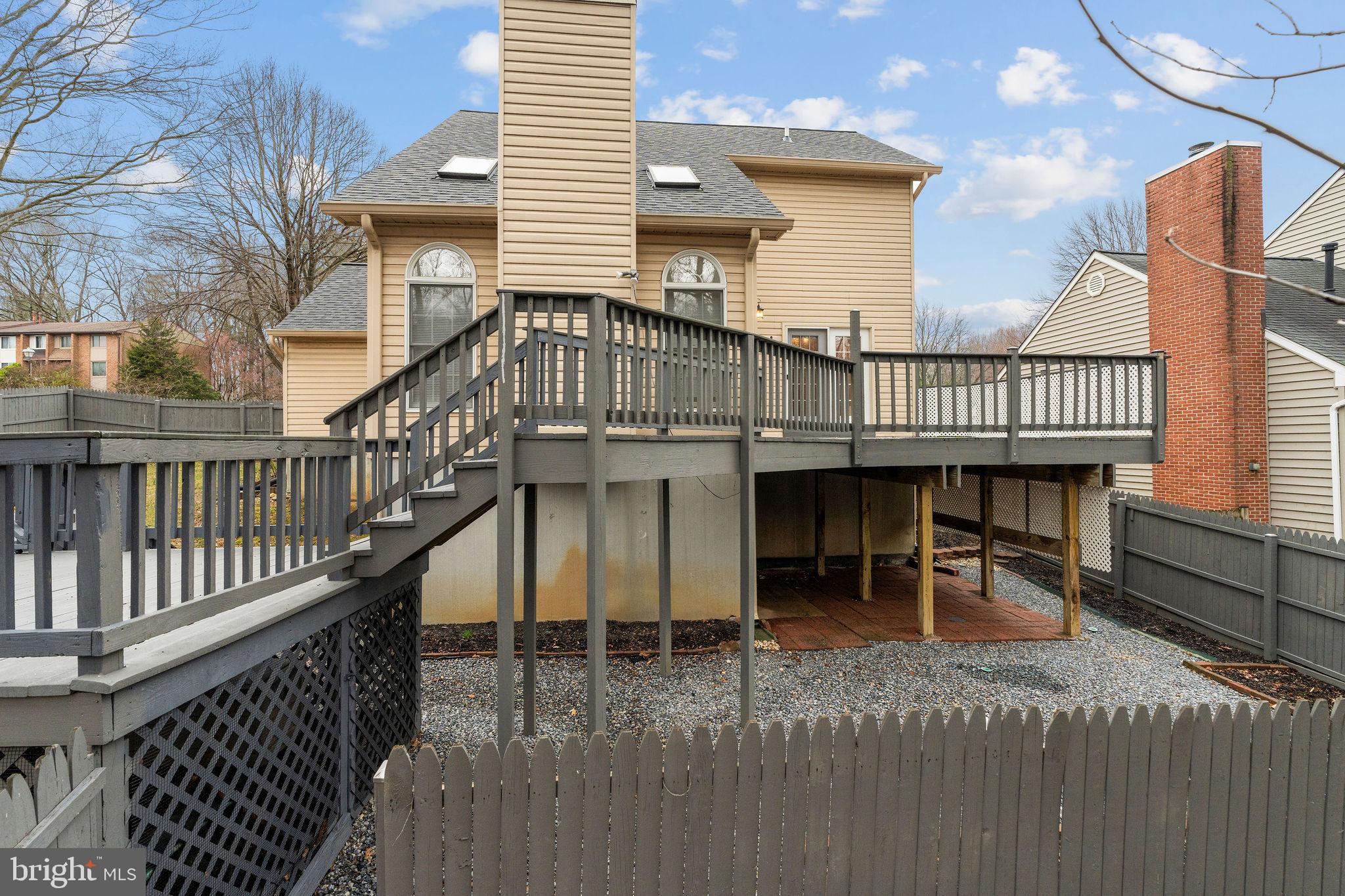9301 Bellbeck Road Baltimore, MD 21234 - Photo 30 of 35 a view of a roof deck with chair and iron stairs