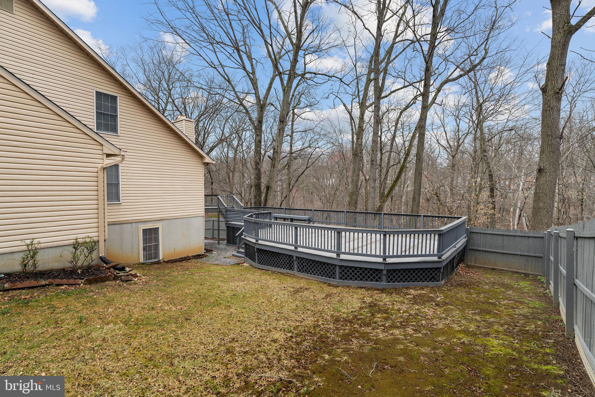 9301 Bellbeck Road Baltimore, MD 21234 - Photo 34 of 35 a view of backyard with deck and seating area
