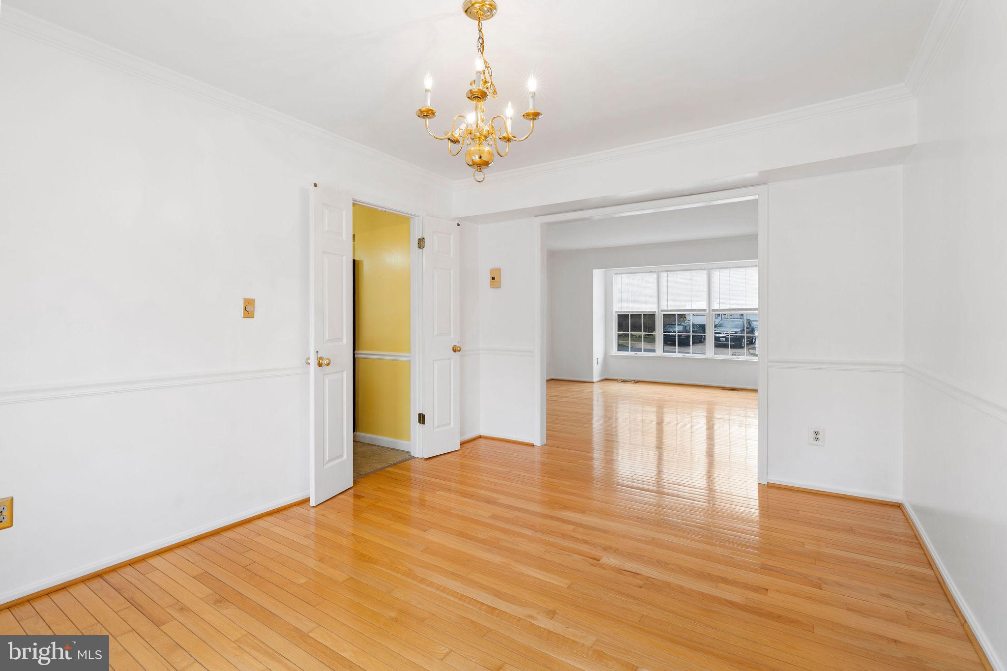 9301 Bellbeck Road Baltimore, MD 21234 - Photo 7 of 35 a view of an empty room with a window