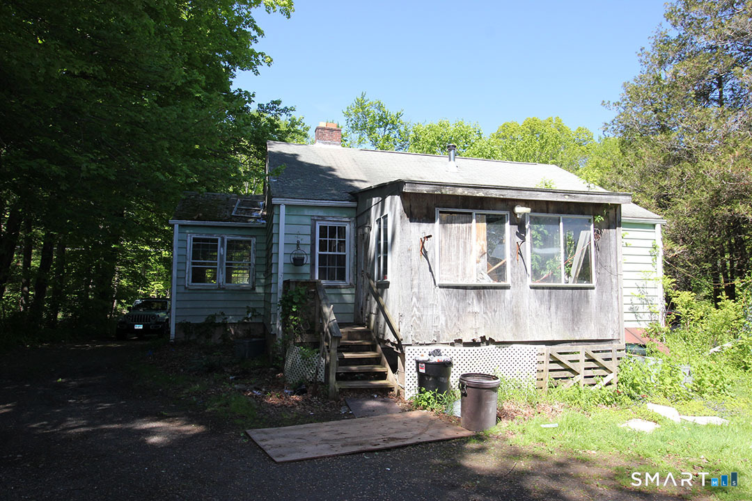 170 Ross Road Middlefield, CT 06481 - Photo 2 of 9 a front view of a house with garden